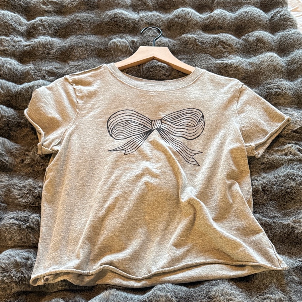 Maeve Beige Short Sleeve Tee with Black Bow Graphic